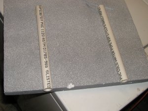 Cut channels or drill holes in your foam and glue PVC sleeves into place.